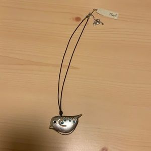 Fossil bird pendant necklace